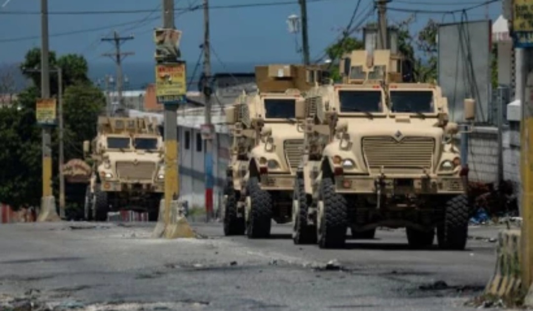 US WARNS OF HEAVY GUNFIRE NEAR ITS EMBASSY IN HAITI