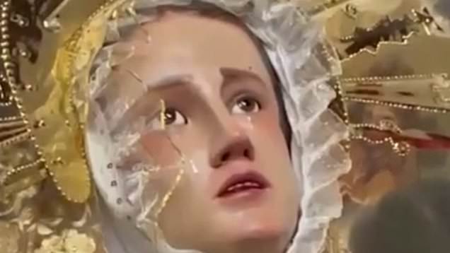 VIRGIN MARY'S STATUE PRE-MOURNS POPE'S DEATH